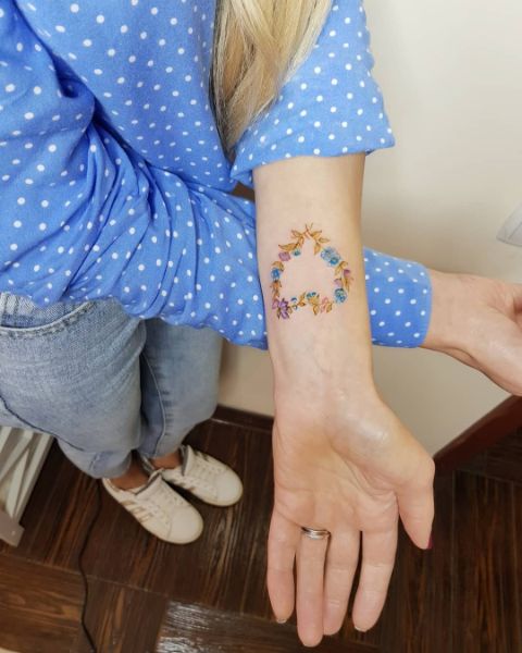 Татуировка Бабочек в Виде Сердца на Руке